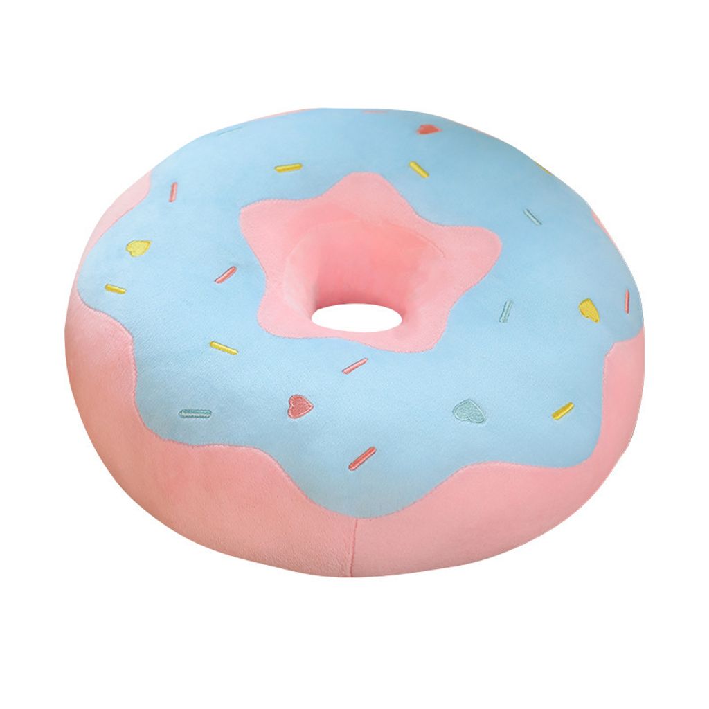 Donut plush pillow on white background
