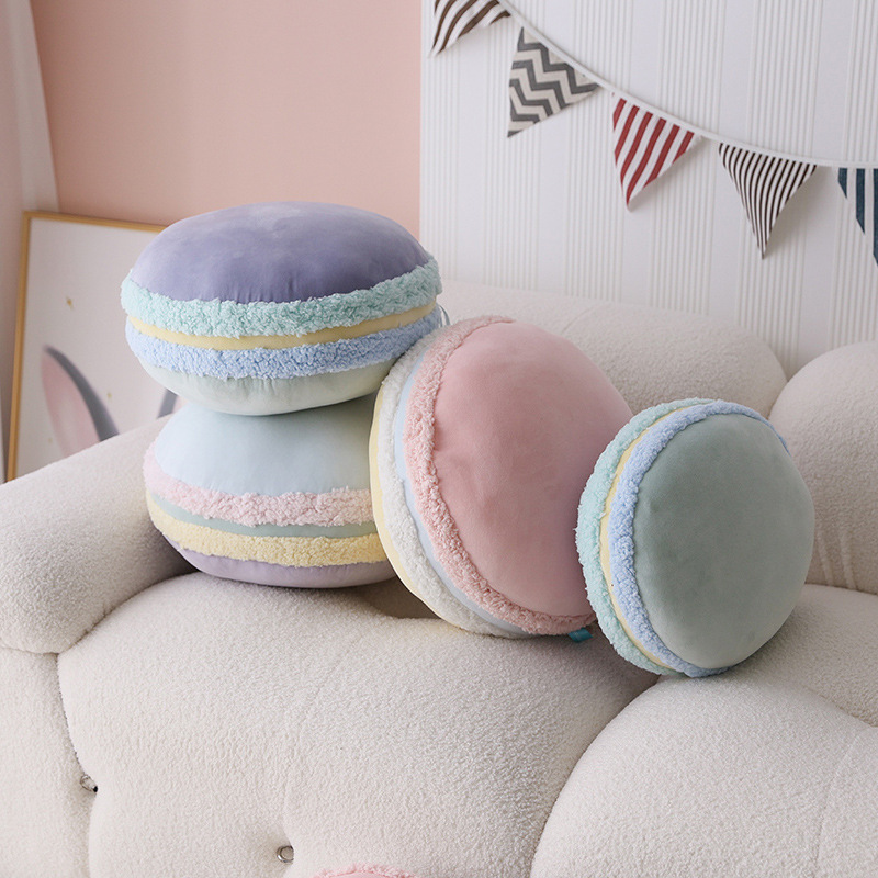 Macaron plush pillow on sofa in pastel colors