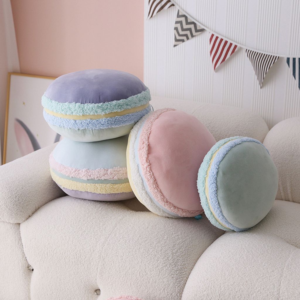 Macaron plush pillow on sofa in pastel colors