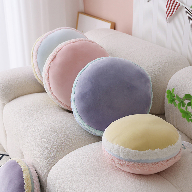 Macaron plush pillow on sofa in pastel colors