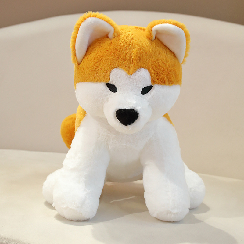 Front view of Akita Inu sitting plush toy