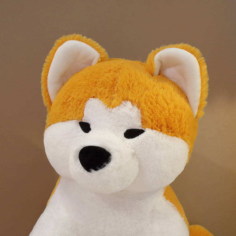Close-up of Akita Inu plush toy face