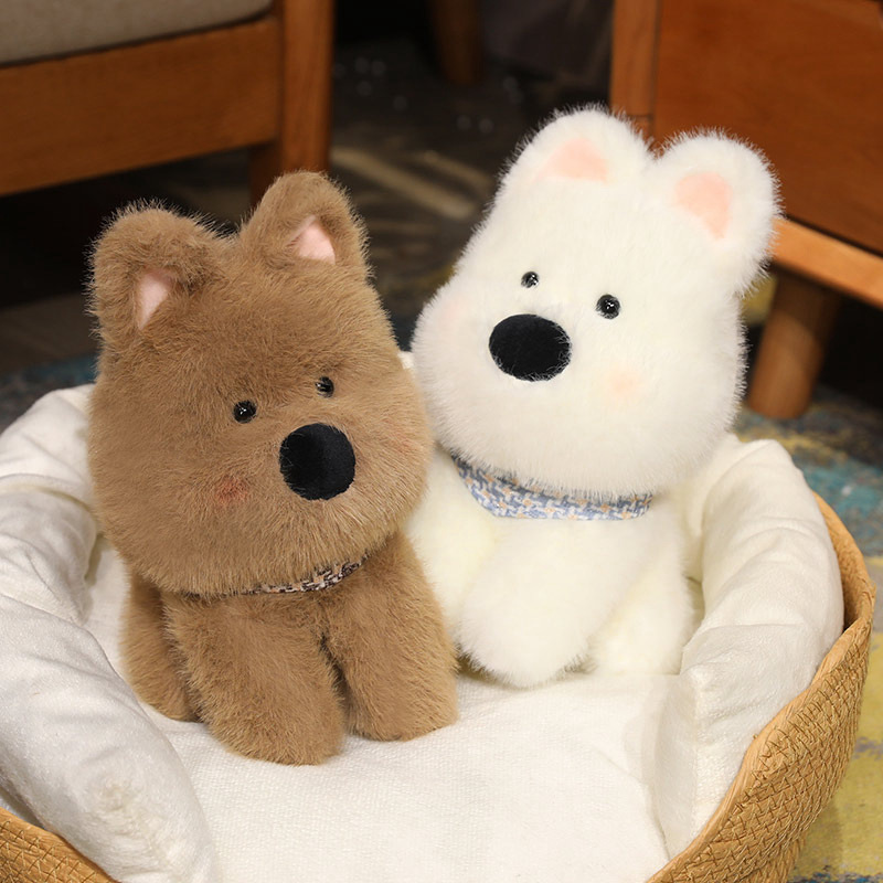 Westie dog plush toys resting in a cozy pet bed