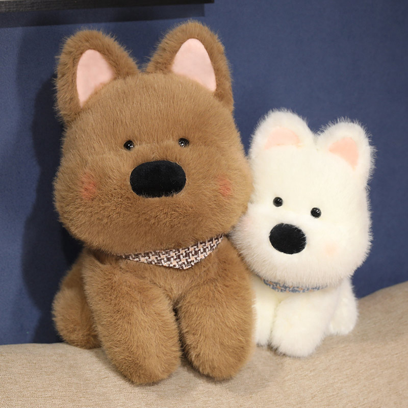 Westie dog plush toys displayed on a sofa