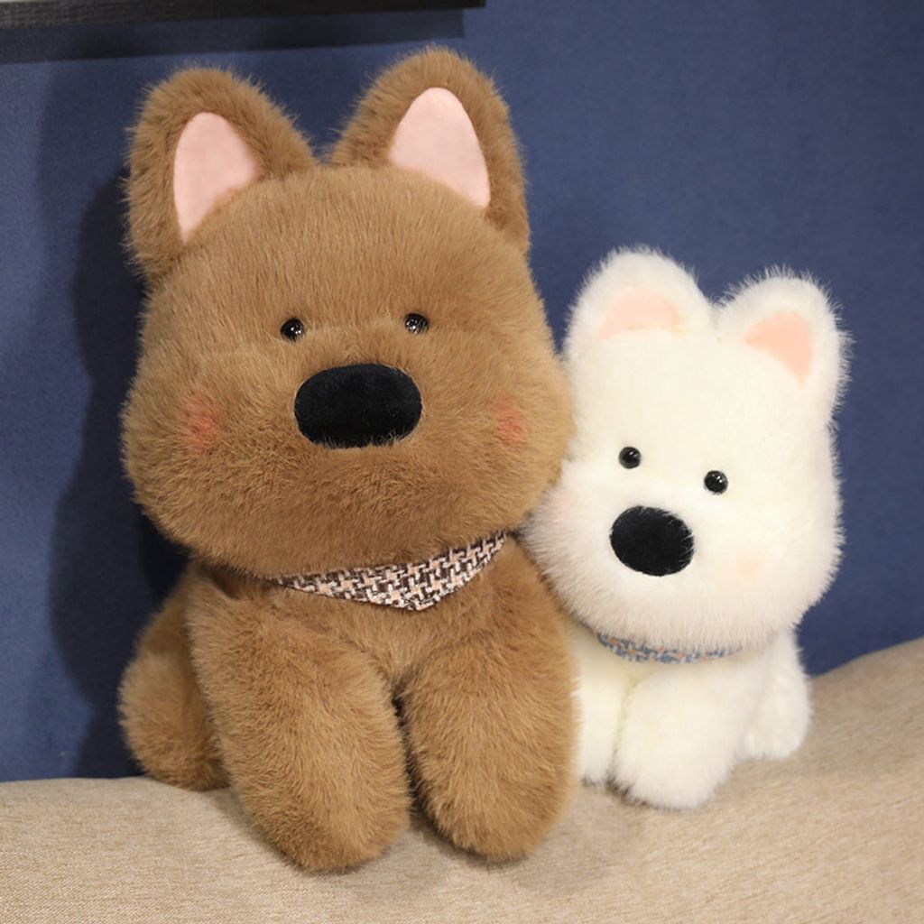 Westie dog plush toys displayed on a sofa