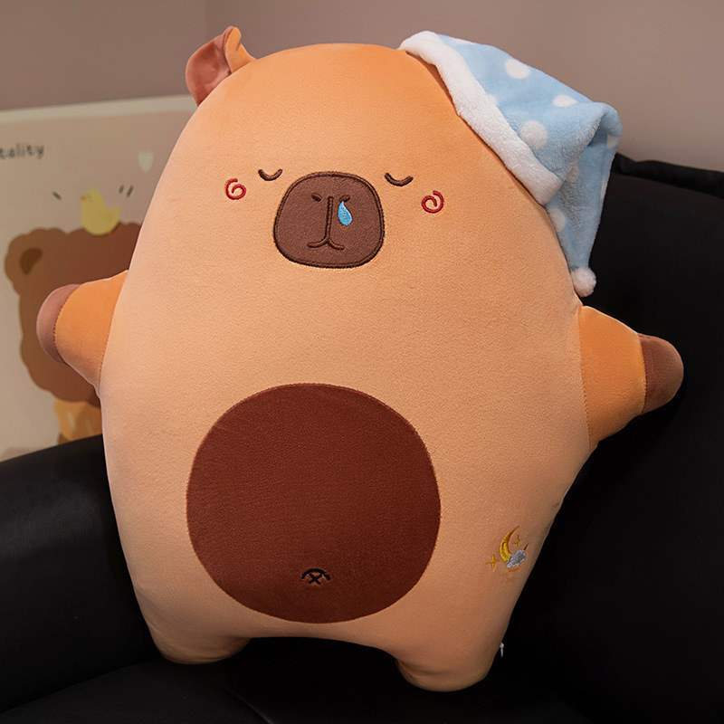 Sweet dreams animal plush pillow in capybara design with sleep hat