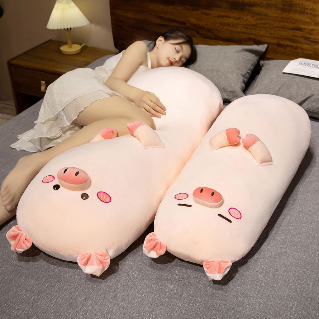Cute pig long plush pillow providing full body support for side sleeping