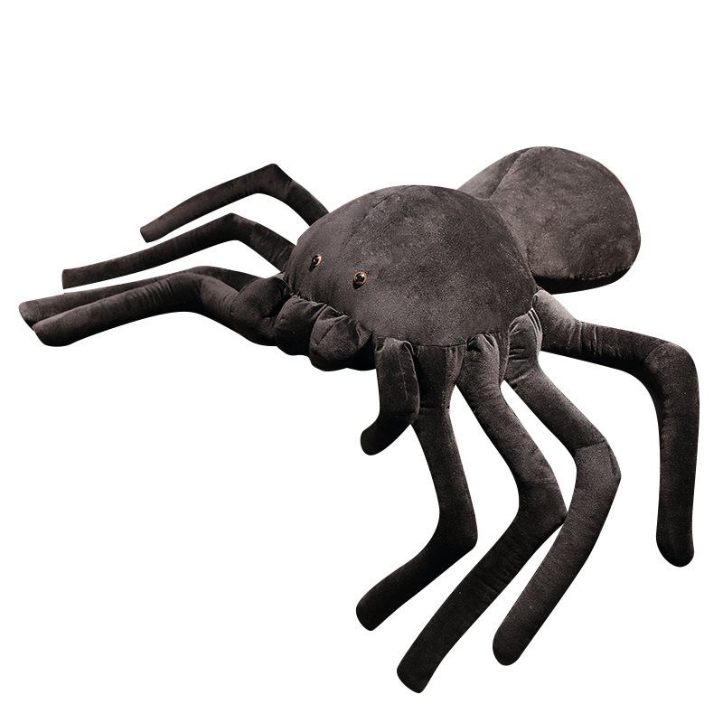 Giant spider plush pillow on white background