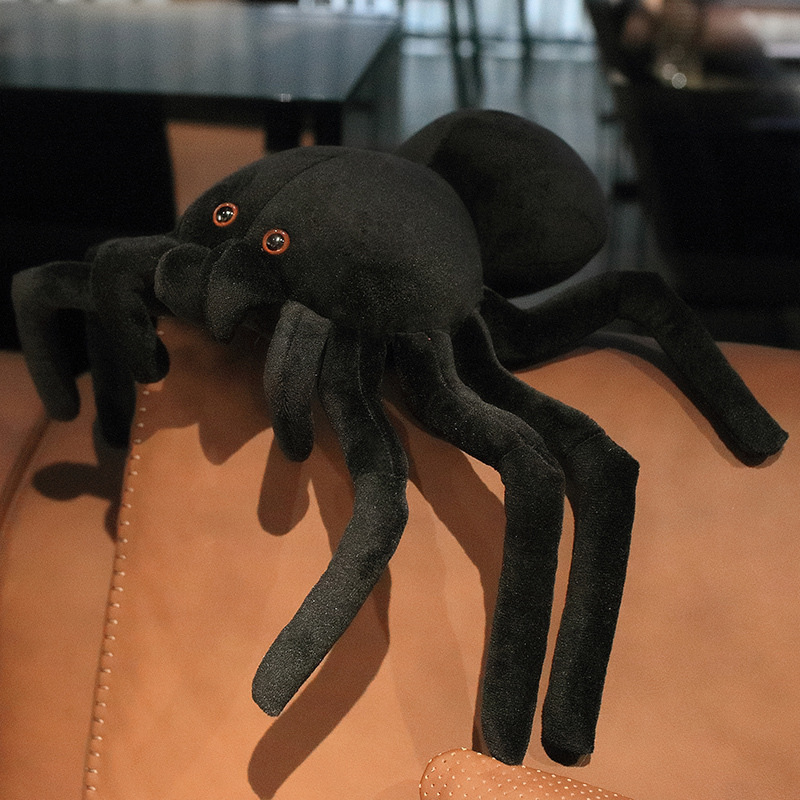 Giant spider plush pillow side view with long legs