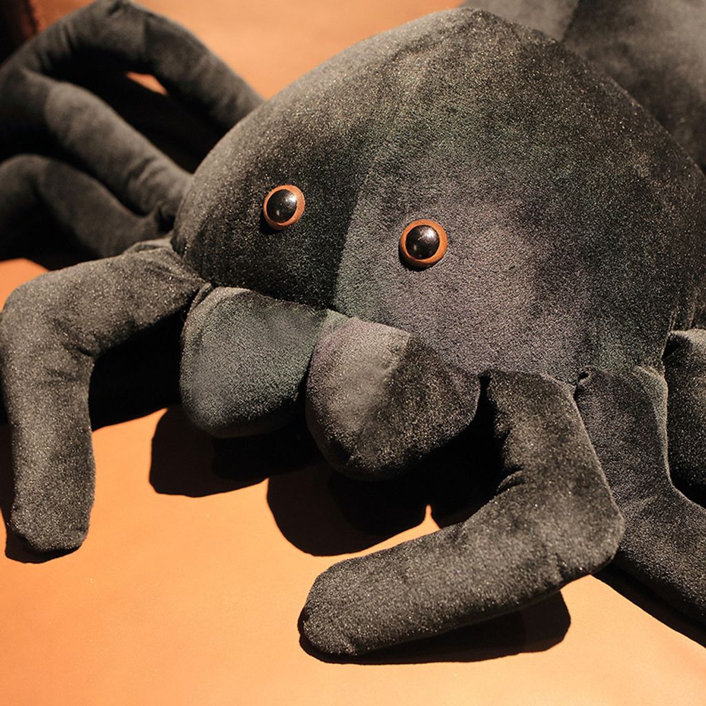 Giant spider plush pillow face and eyes detail