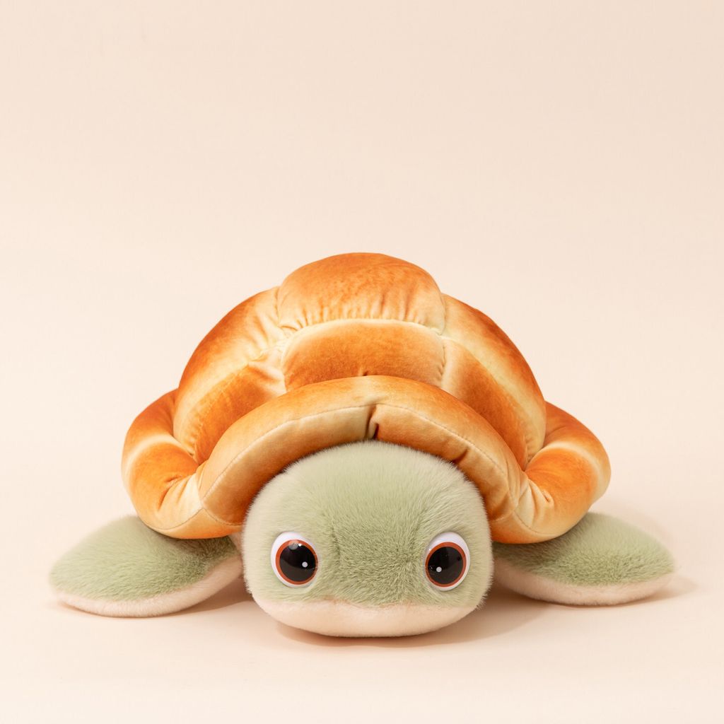 Bread turtle plush toy with soft bread shell and green flippers front view