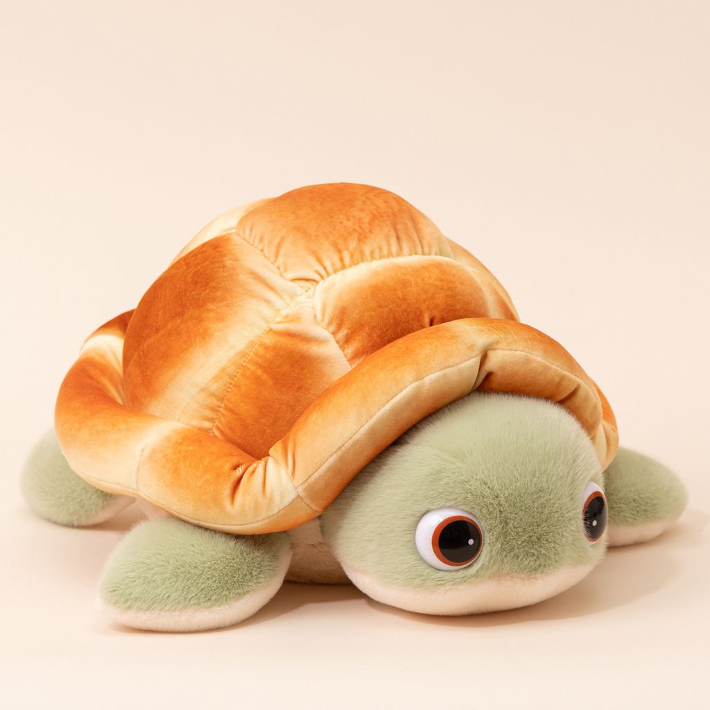 Bread turtle plush toy with soft bread shell and green flippers angled view