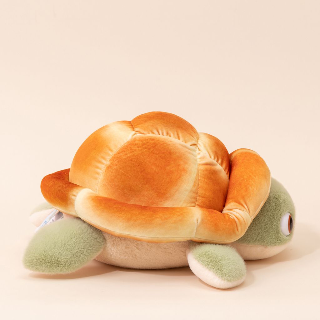 Bread turtle plush toy showing soft bread shell from back and side