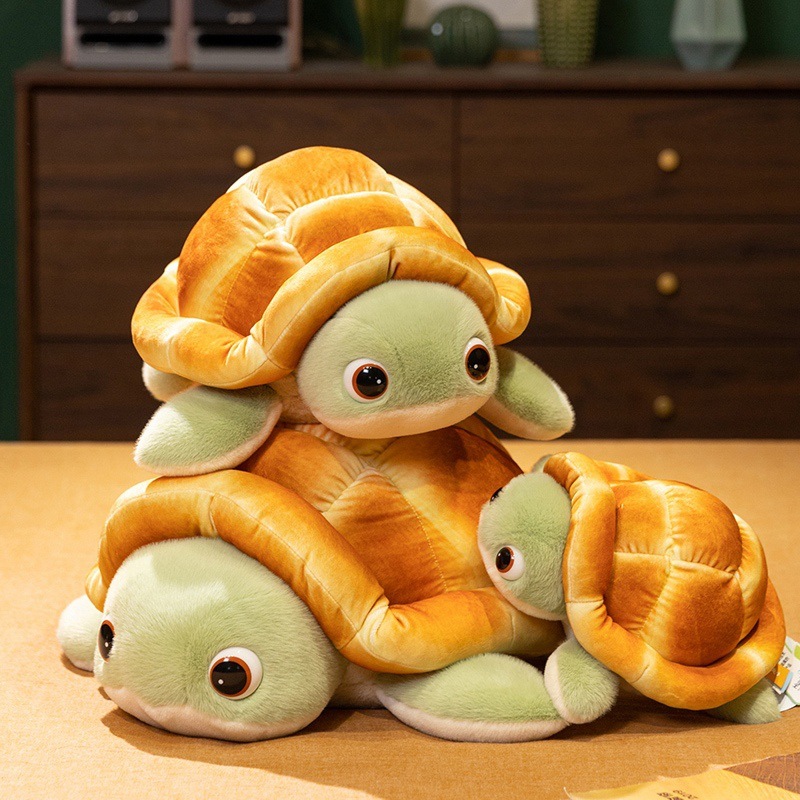 Three sizes bread turtle plush toys stacked to show size comparison