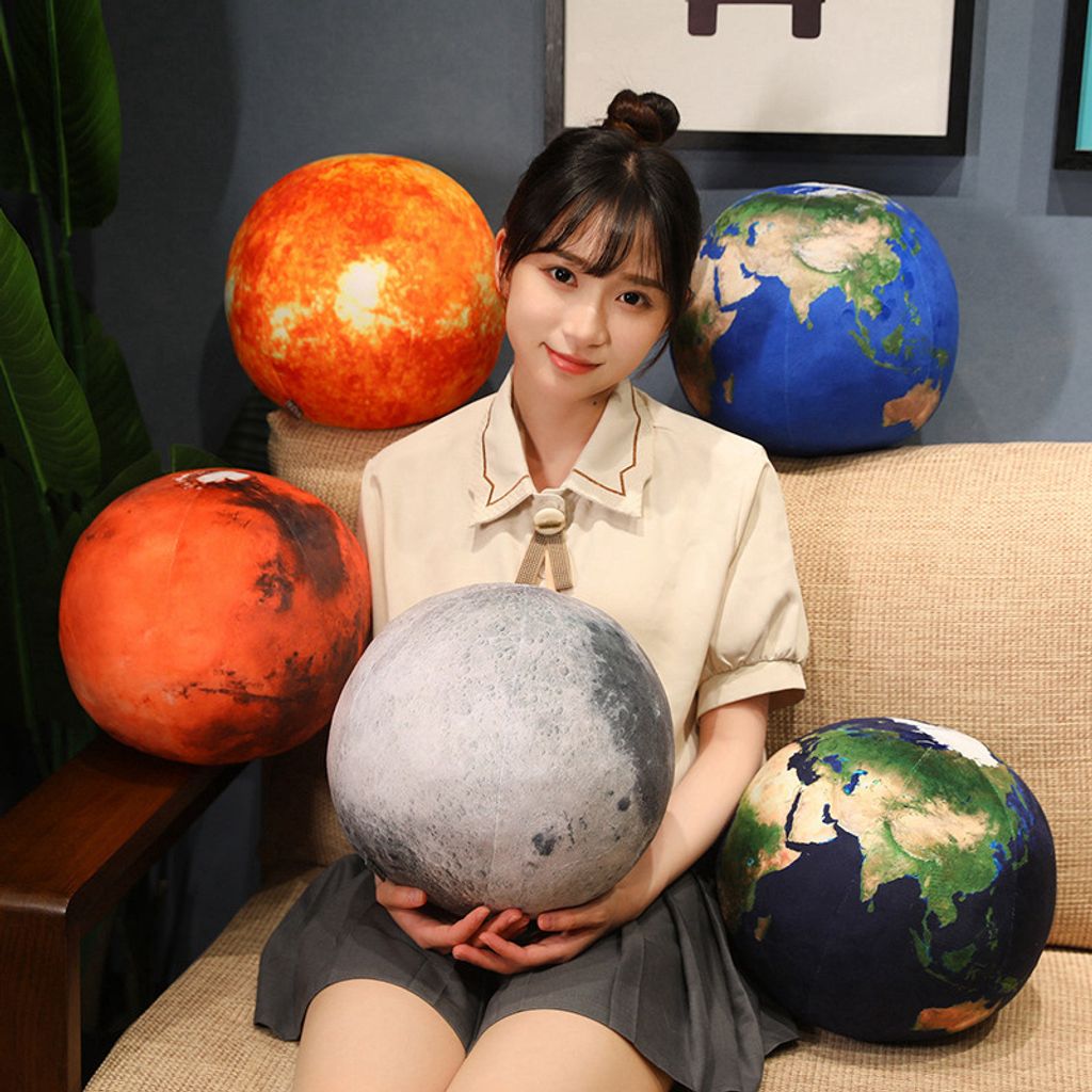 Soft planet plush pillows in various colors