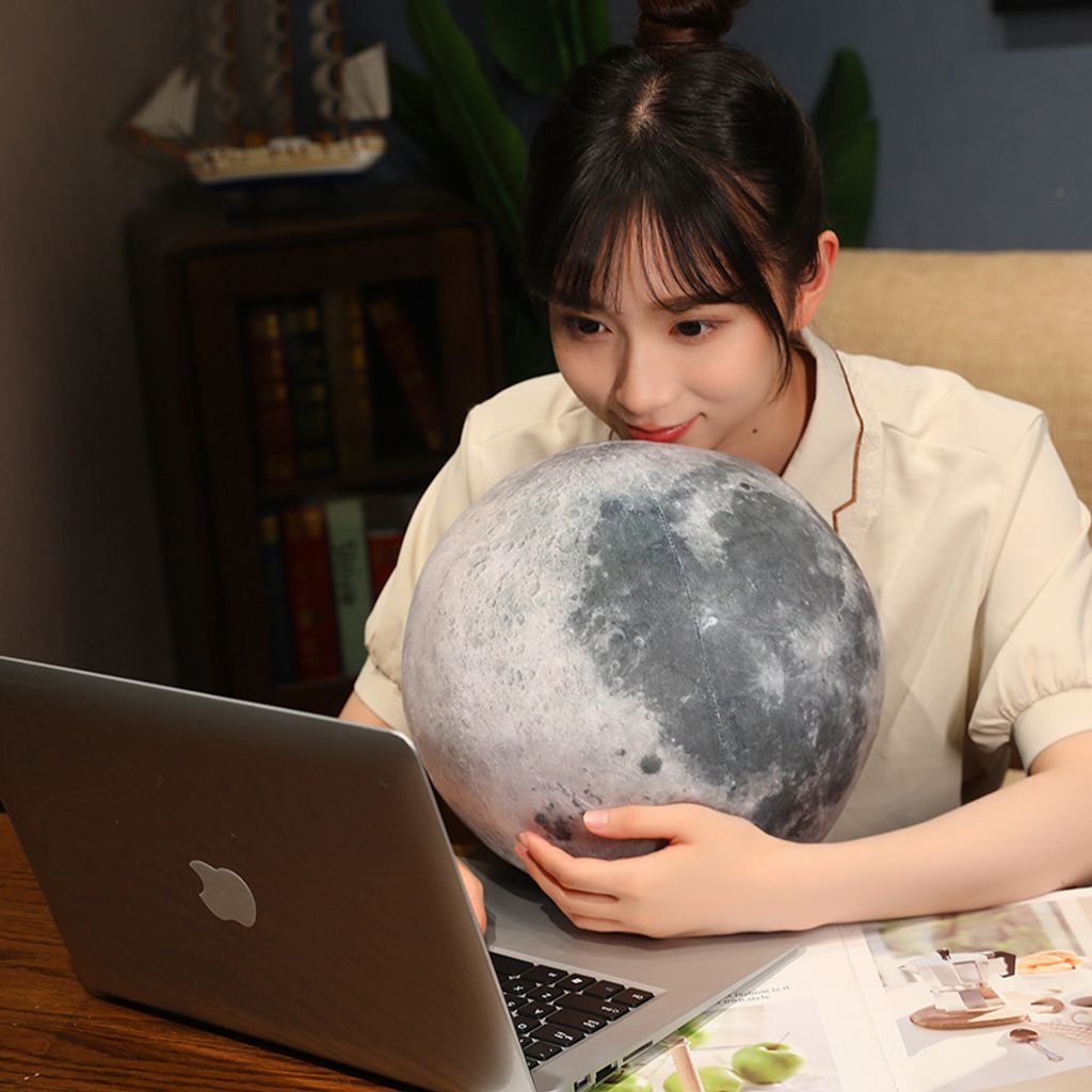 Moon planet plush pillow on desk for cozy decoration
