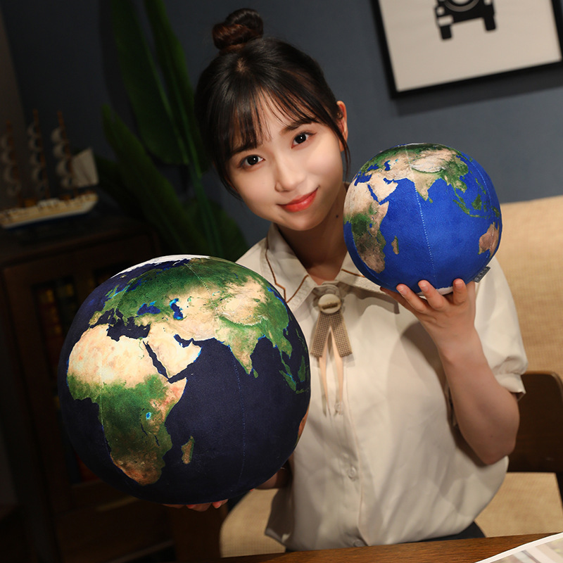 Earth planet plush pillow in two different sizes