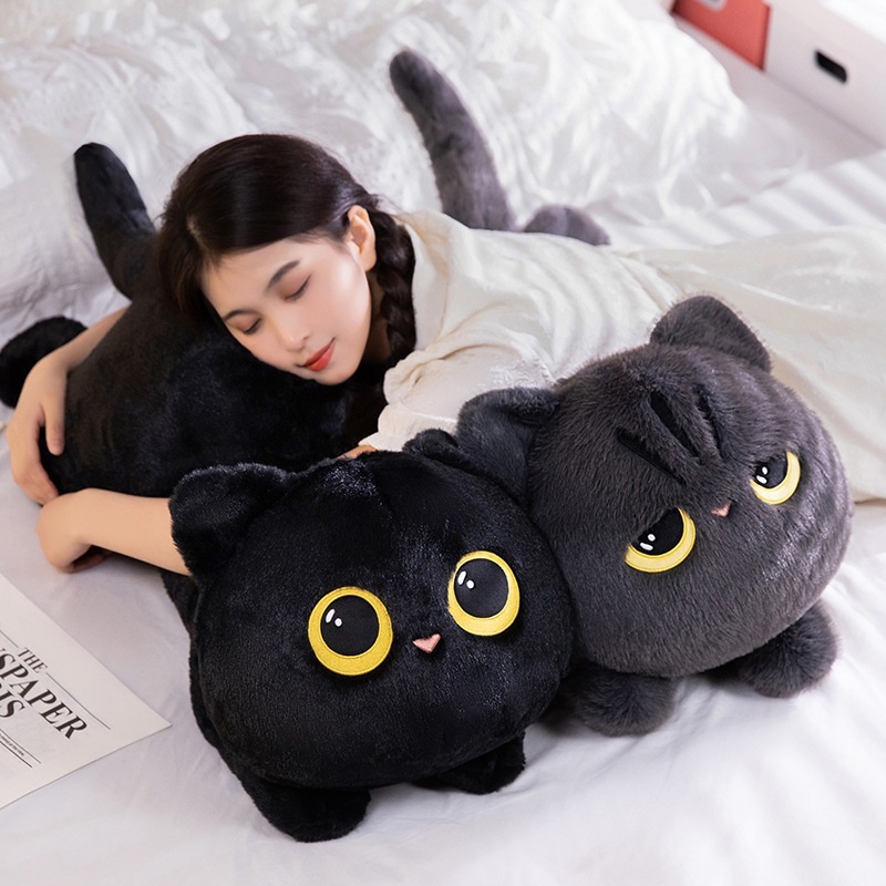 Soft lying cat plush pillows in gray and black used for hugging and sleeping