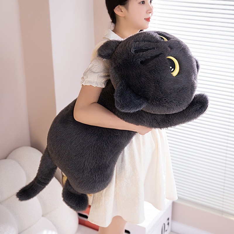 Large gray lying cat plush pillow being hugged, showing full body size