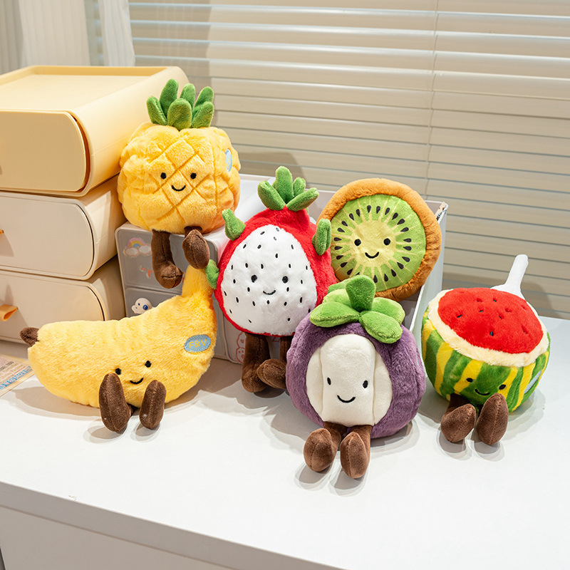 Cute eco fruit plush toys displayed on a desk