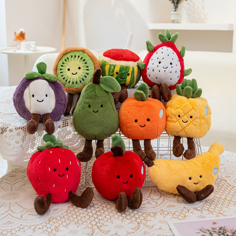 Eco fruit plush toy collection with banana, strawberry, apple, kiwi, pineapple, and more on a table