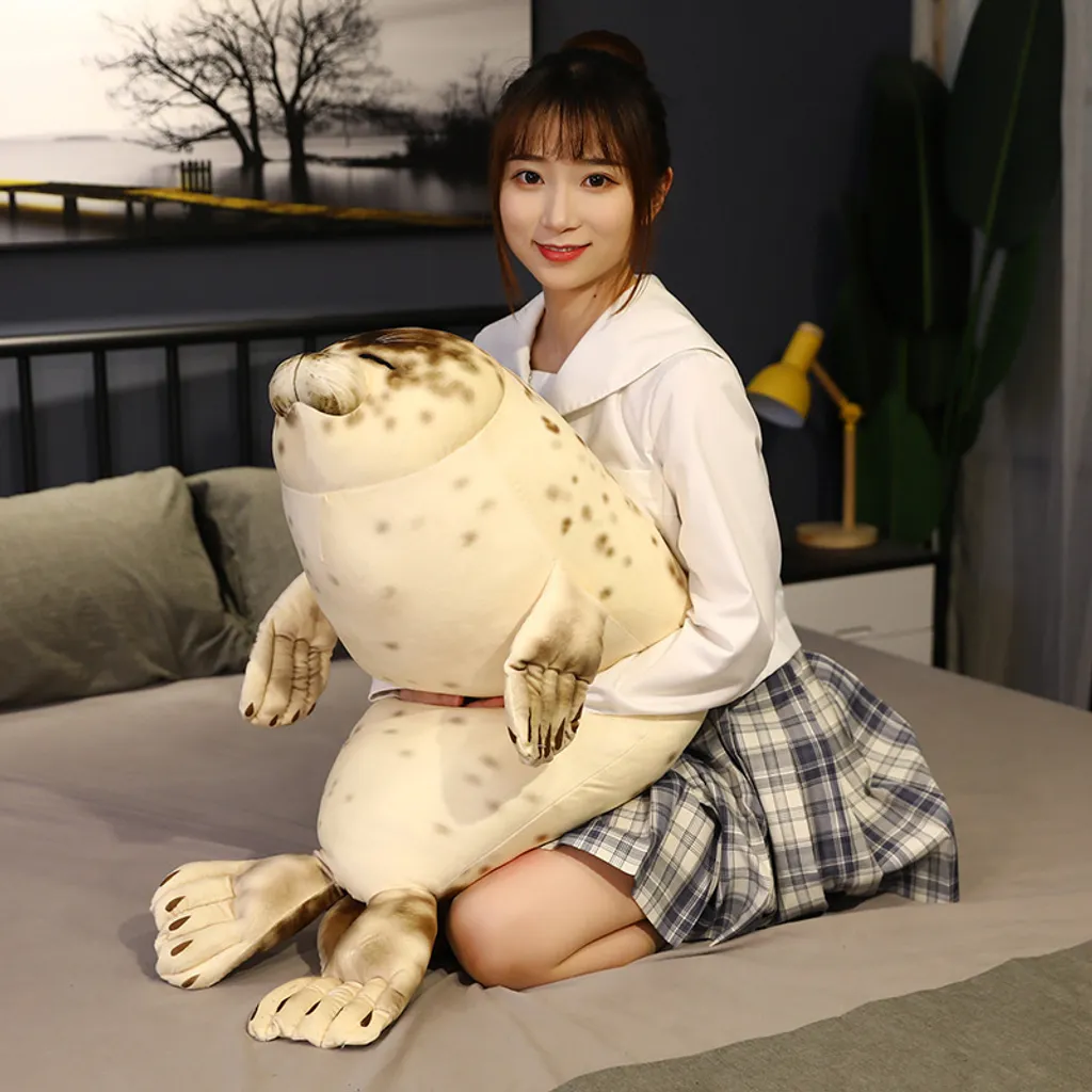 Large seal plush pillow for hugging on bed with soft and cozy design