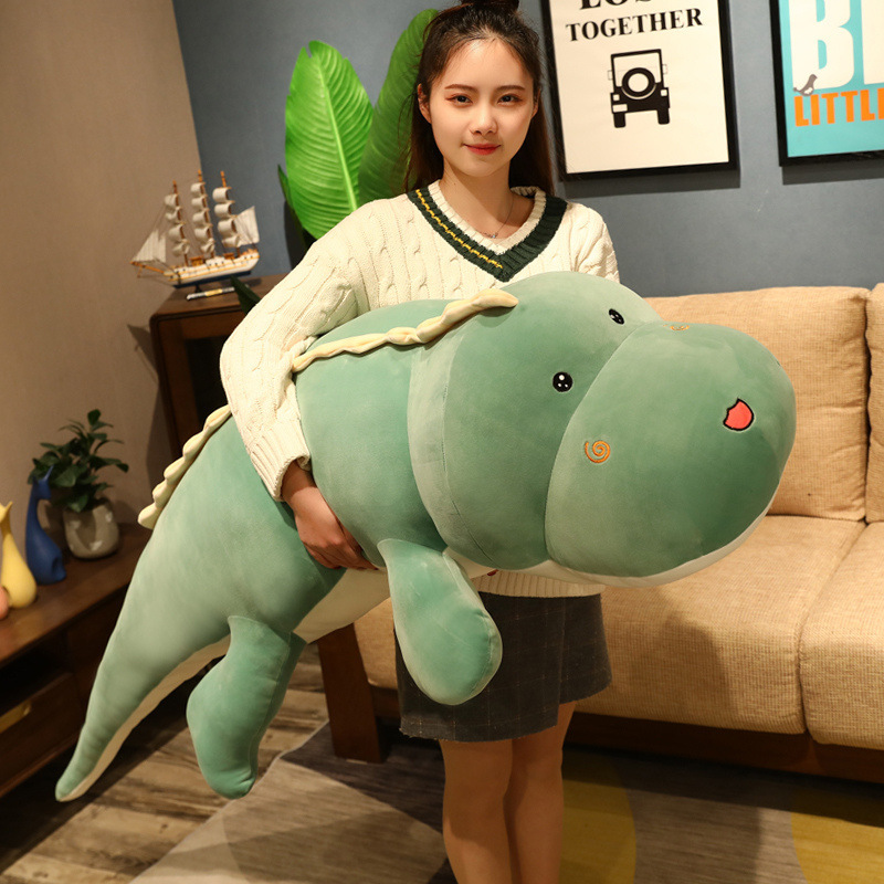 Cute dinosaur plush pillow for hugging and relaxing in a cozy bedroom