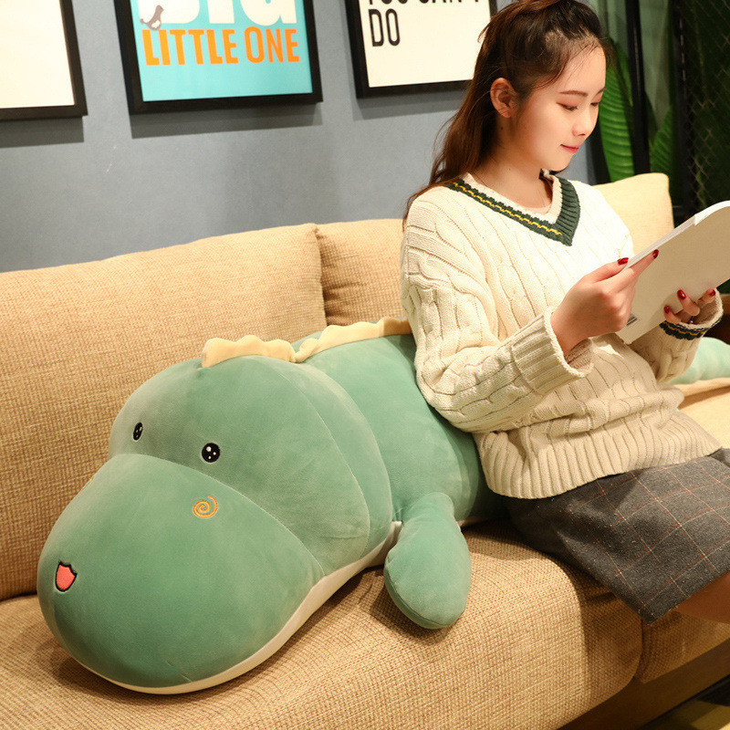 Cute dinosaur plush pillow for relaxing on the sofa