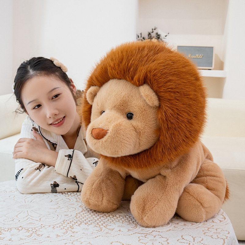 Large lion plush toy sitting on table for cozy display