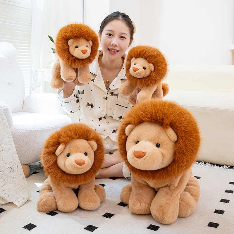 Lion plush toys displayed in multiple sizes showing a clear size comparison and a cozy home display setting