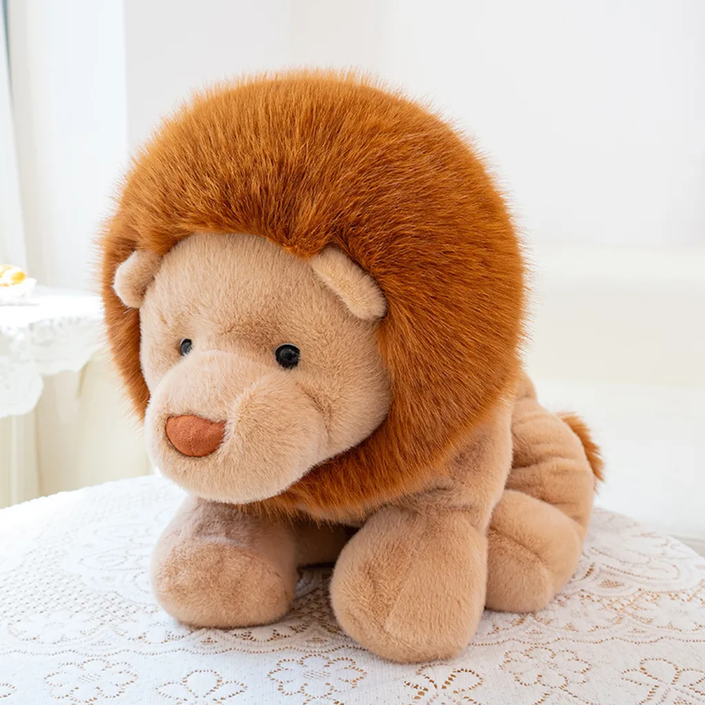Lion plush toy in lying position with soft plush fabric for cozy relaxation