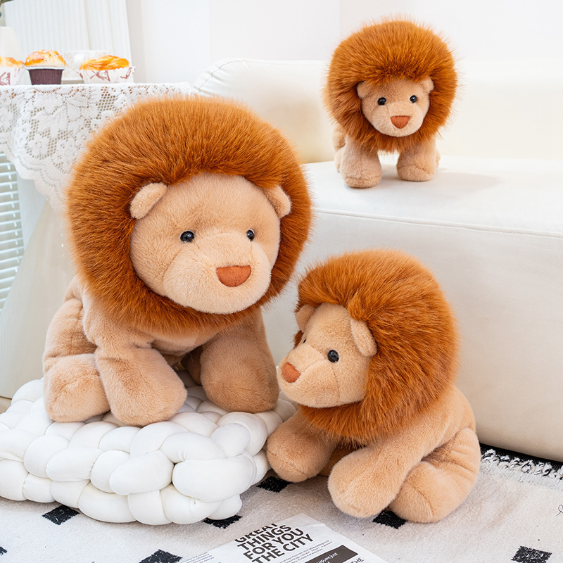 Lion plush toys in different sizes on sofa and floor