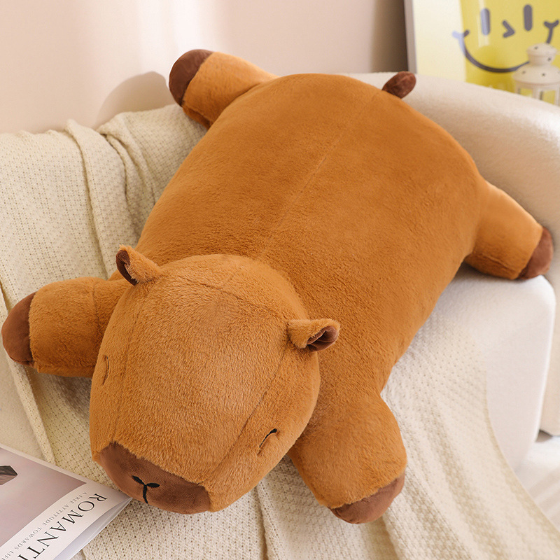 Large capybara plush cushion on a sofa, soft plush pillow for hugging, relaxing, and adding a cozy atmosphere to the living space