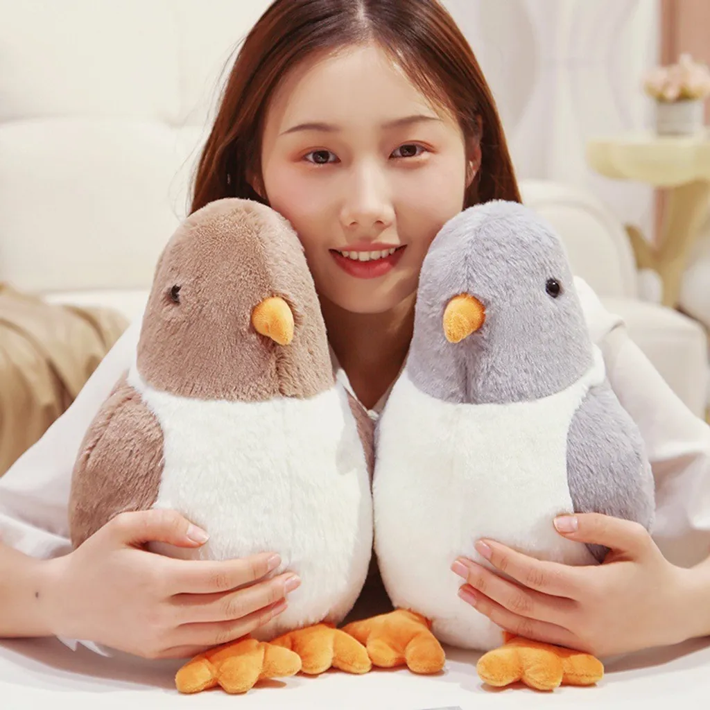 Brown and gray pigeon plush toys displayed side by side, highlighting cute design and soft cuddly shape