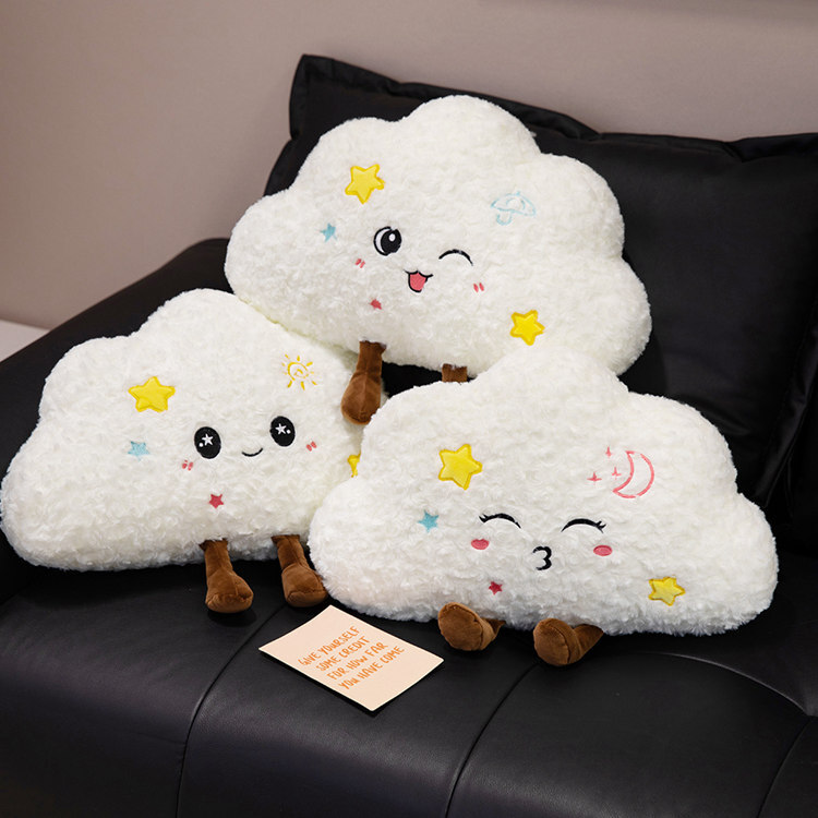Three cloud plush pillows with cute expressions for cozy home decor