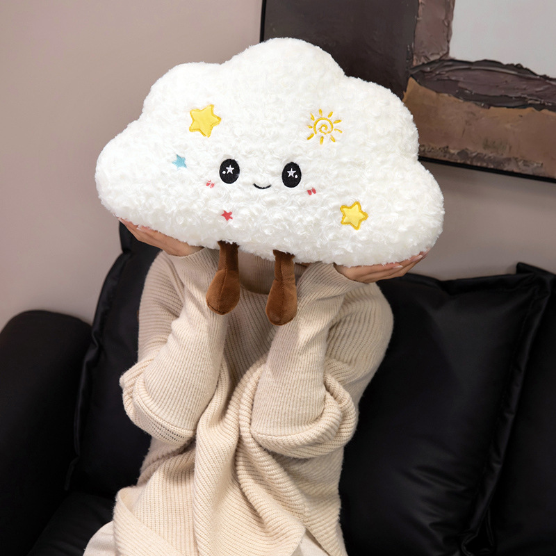 Cloud plush pillow with cute smiling face and star details, perfect for home decor and relaxing