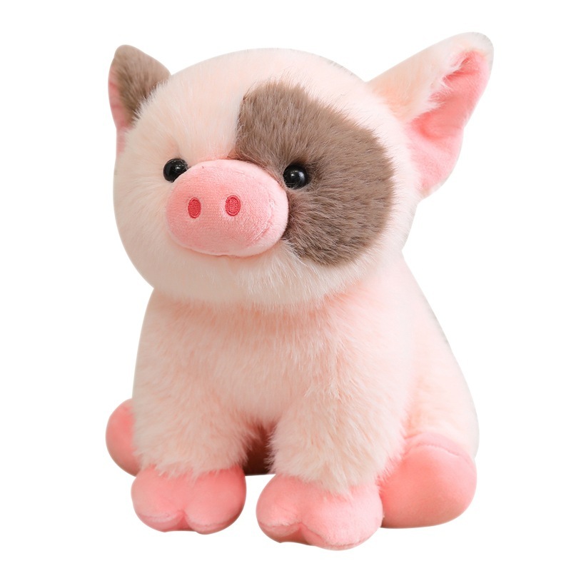 Cute mini pig plush toy in pink color with soft plush texture and rounded sitting design on white background