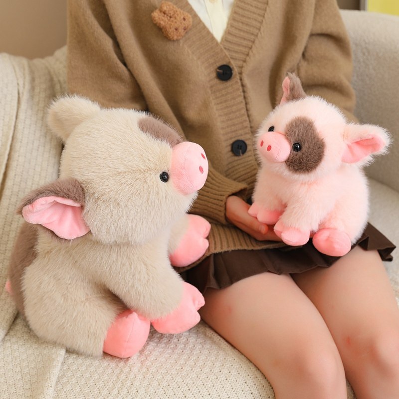 Two cute mini pig plush toys sitting together on a sofa, soft plush texture and pastel colors, creating a warm and cozy home decor scene