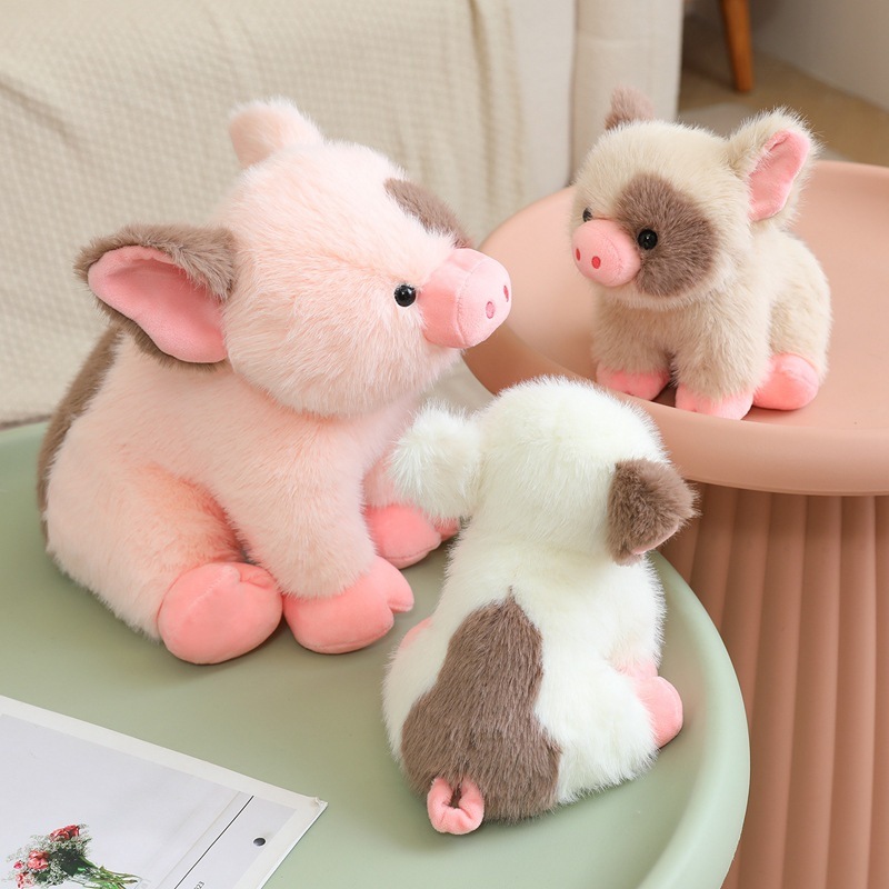 Cute mini pig plush toys arranged on tabletop, soft and fluffy stuffed animals suitable for cozy room decoration, gifting, and plush toy collections