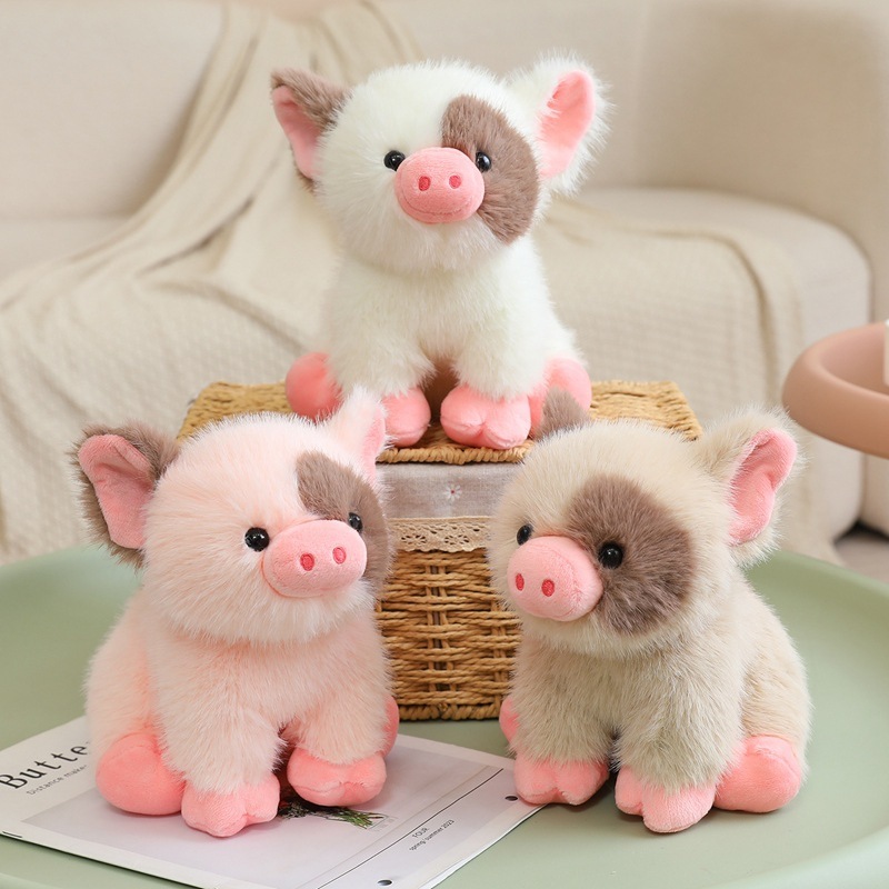 Cute mini pig plush toys displayed together in a cozy home setting, showcasing soft plush texture and rounded sitting design
