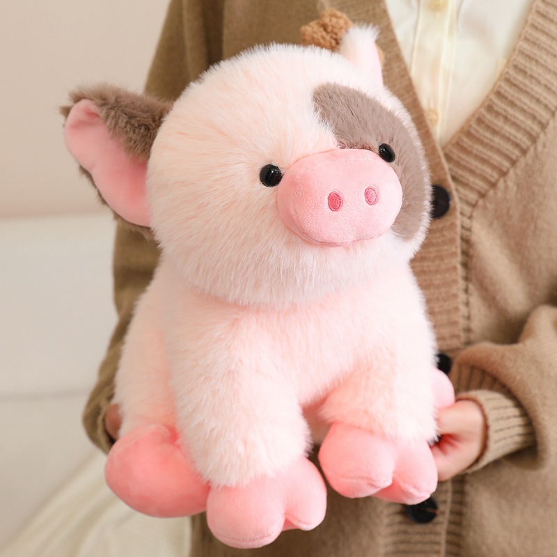Close-up of cute mini pig plush toy with fluffy texture, pink snout, and soft pastel colors, highlighting plush details for decorative display or cozy companion use