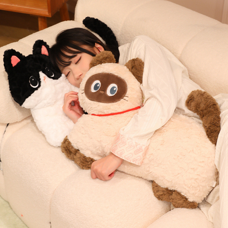 Fluffy dog and cat plush pillows arranged on a sofa, featuring soft textures and cute animal designs, creating a cozy and relaxing home atmosphere ideal for hugging, resting, and lounging.