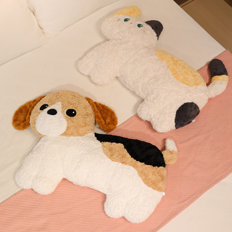 Fluffy dog and cat plush pillows placed on bed, soft hugging body pillows for sleeping and cozy bedroom comfort