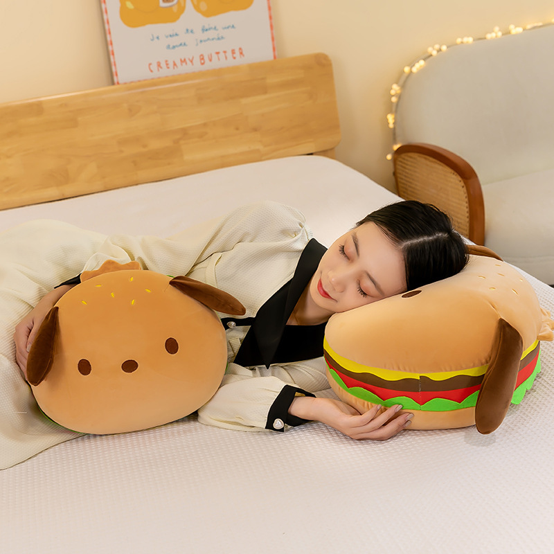 Burger dog plush pillow used on a bed for hugging and sleeping, soft and supportive design creating a cozy and relaxing bedroom atmosphere