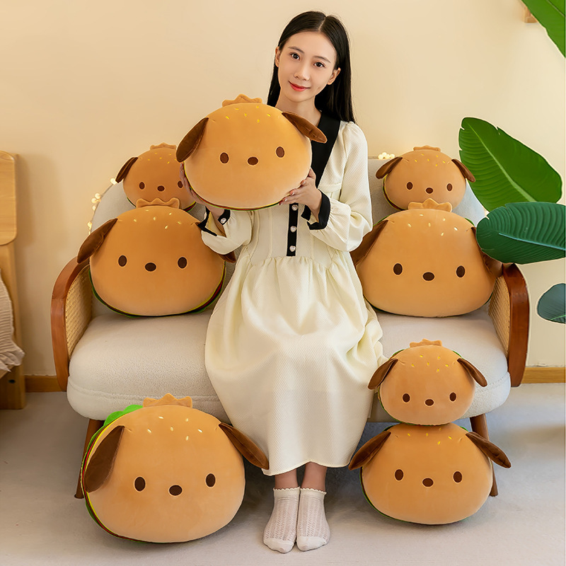 Burger dog plush pillows displayed in multiple sizes on a sofa, cute food themed plush cushions for hugging, home decor, and cozy spaces