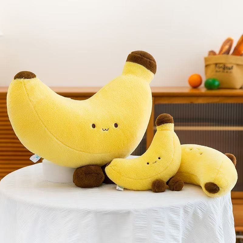 Banana plush toy with legs size comparison displayed together, different sizes for cuddling and decorative use
