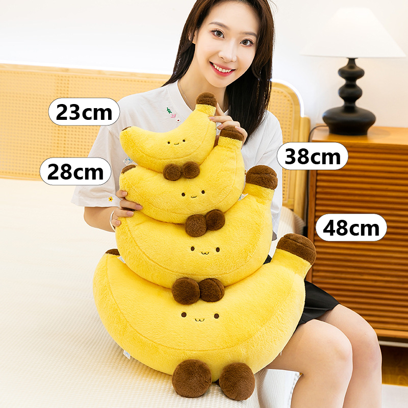 Banana plush toy with legs showing size options from small to large for hugging and home decor