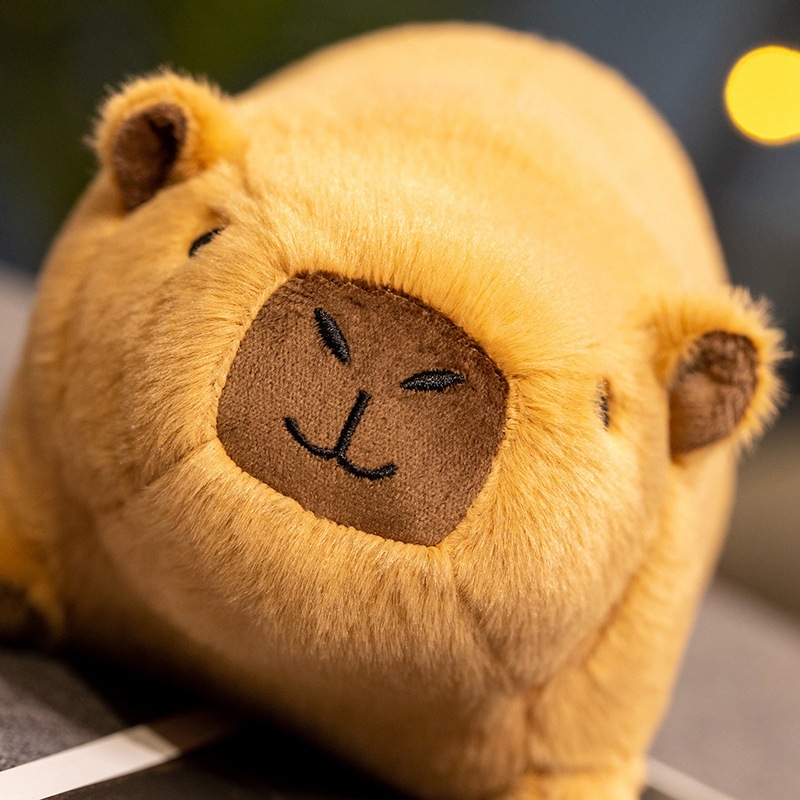 Capybara plush toy close up face soft plush texture