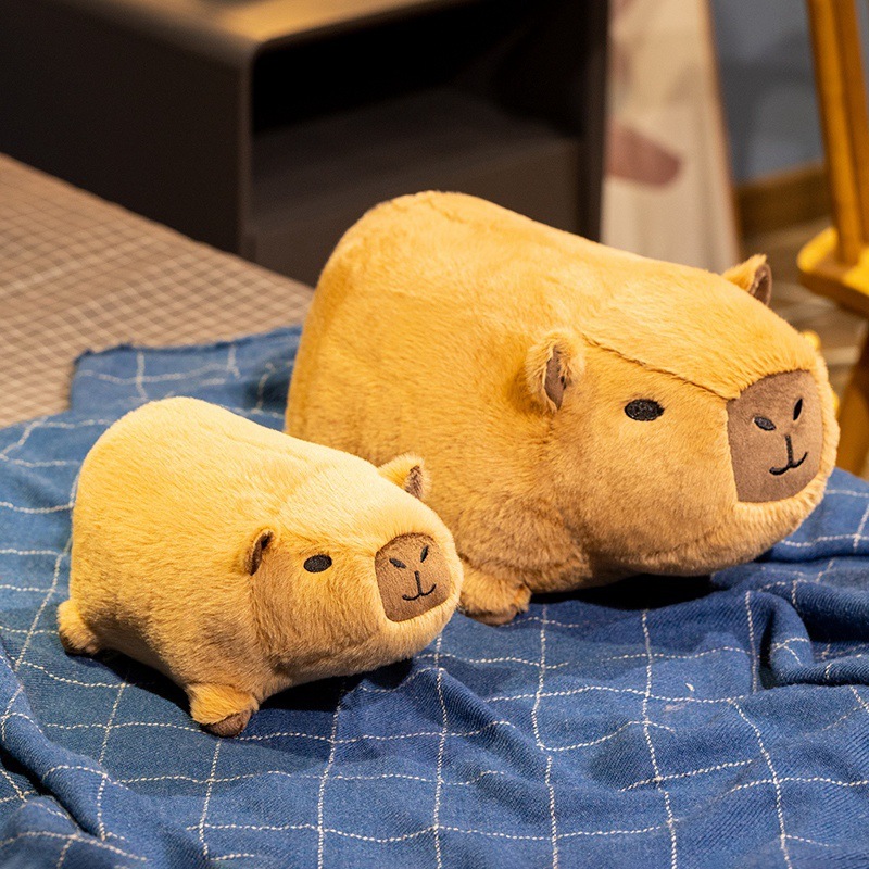 Capybara plush toy size comparison with small and large plush displayed together, soft stuffed animal for hugging and decoration