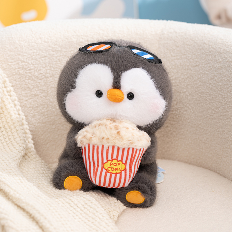 Coco penguin plush toy holding popcorn, soft penguin stuffed toy with fun snack detail, cozy plush for relaxing moments, sofa decor, and thoughtful gifts